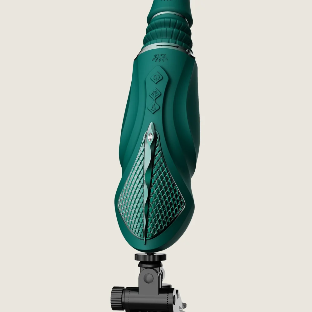 ZALO® Sesh Compact Sex Machine equipped with two replaceable vibrating massage sticks in Turqoise Green color.