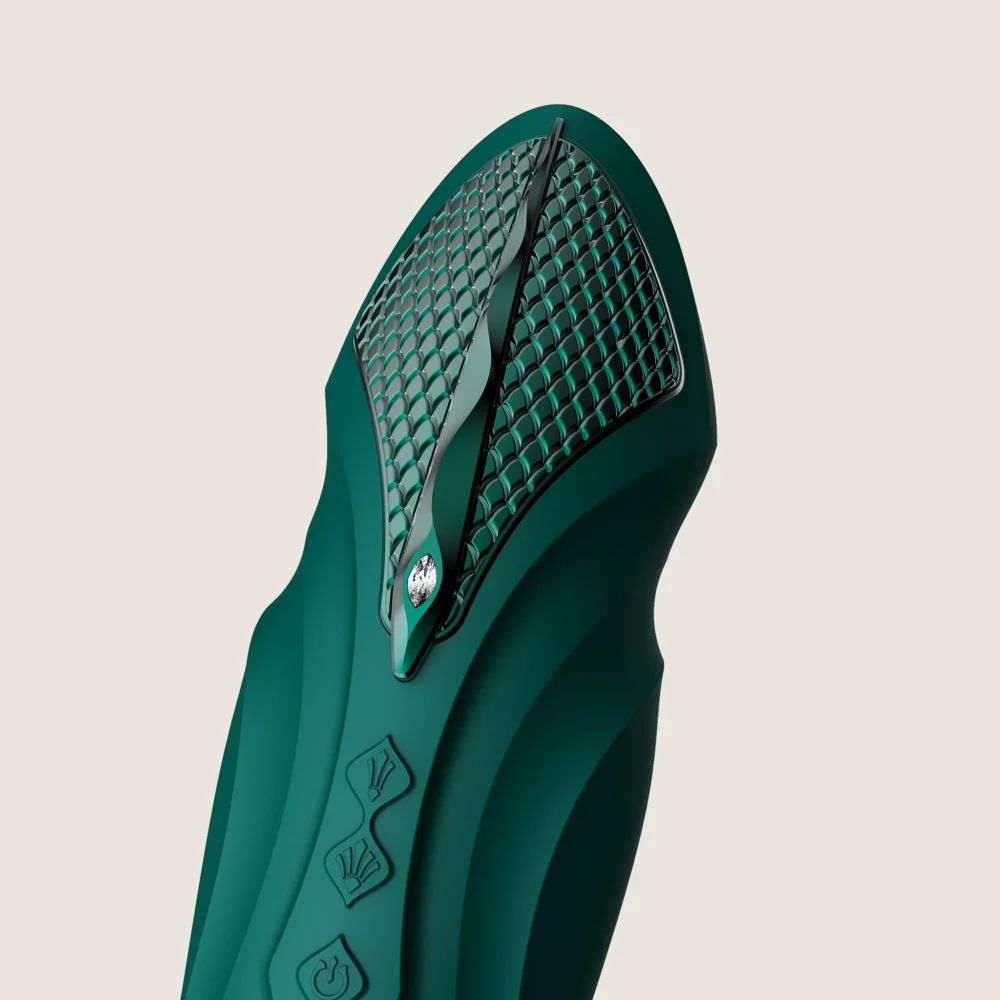 ZALO® Sesh Compact Sex Machine equipped with two replaceable vibrating massage sticks in Turqoise Green color.