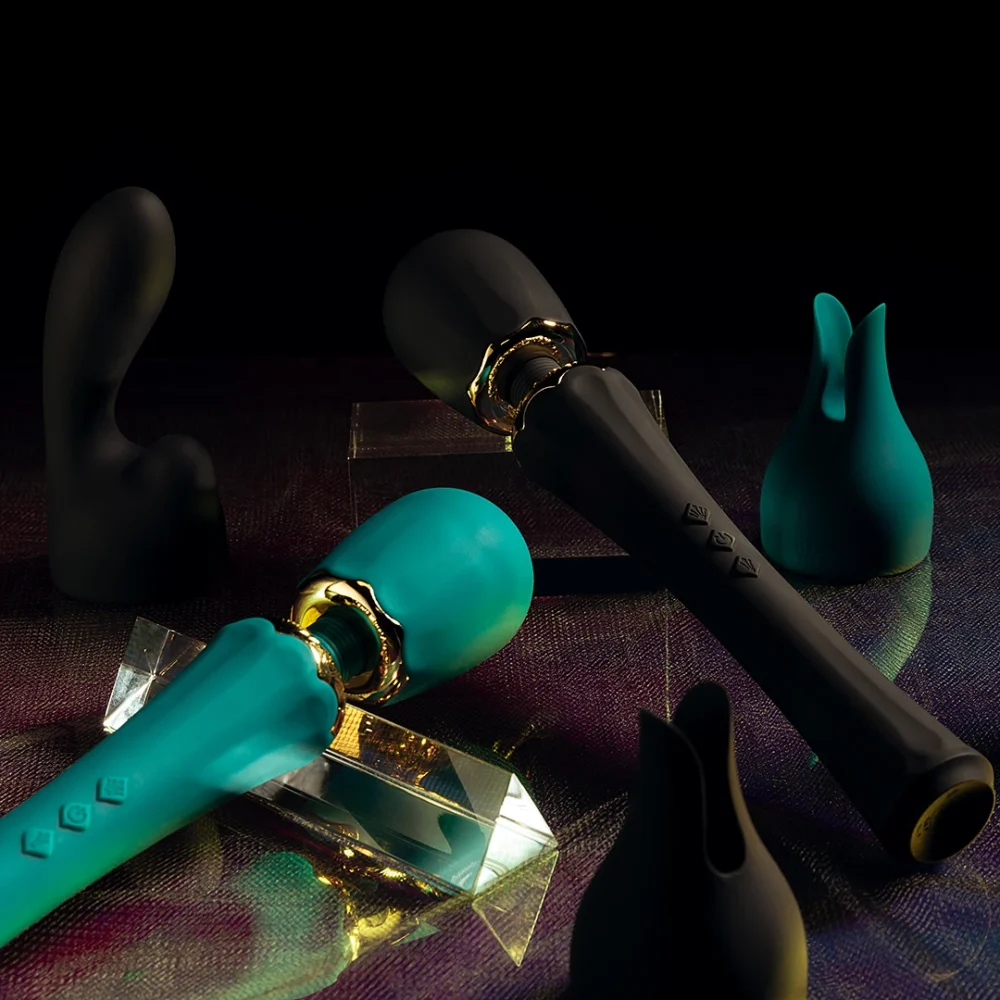 ZALO® Kyro Massager with two multi-functional silicone attachments in Turquiose Green and Obsidian Black color.